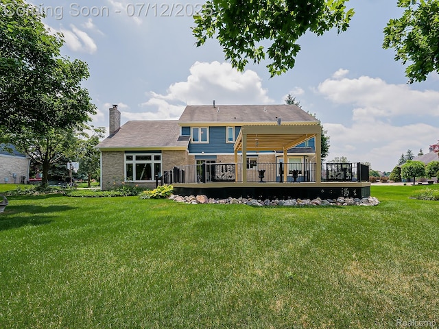 12495 Howland Park Dr, Plymouth, MI 48170 - back of house featuring a chimney, a yard, and a wooden deck