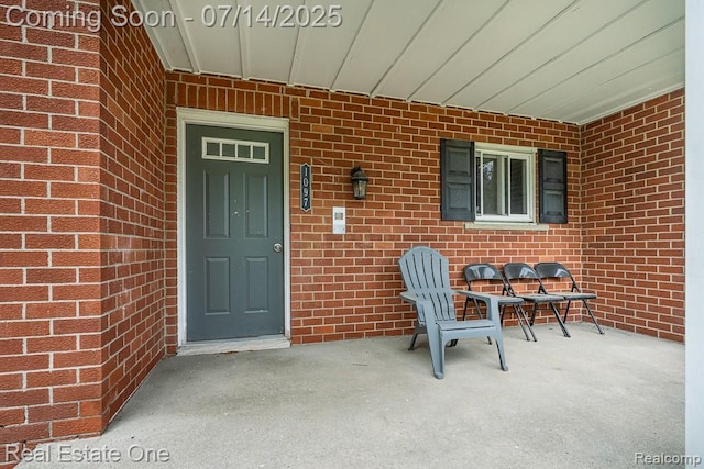 1097 Tienken Ct, Rochester Hills, MI 48306 - property entrance with brick siding
