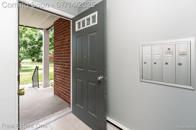1097 Tienken Ct, Rochester Hills, MI 48306 - foyer entrance with tile patterned flooring, healthy amount of natural light, and mail area