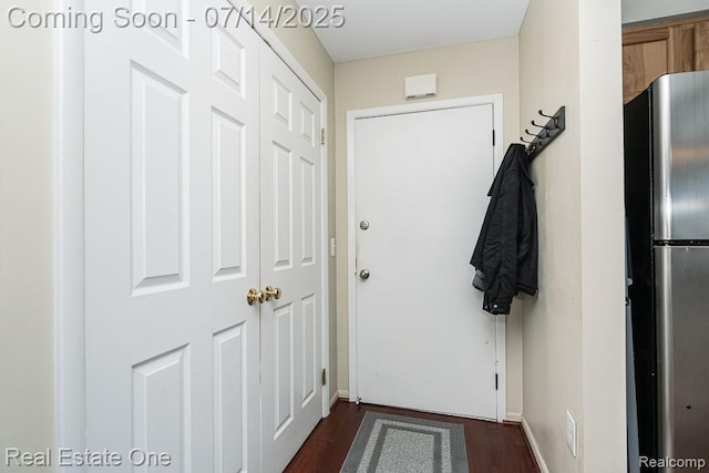 1097 Tienken Ct, Rochester Hills, MI 48306 - doorway with dark wood-style flooring and baseboards