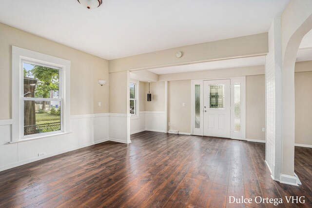 2025 Palace Ave SW, Grand Rapids, MI 49507 - entryway with arched walkways and hardwood / wood-style flooring