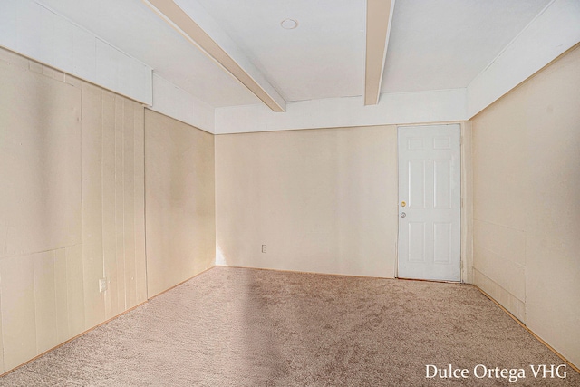 2025 Palace Ave SW, Grand Rapids, MI 49507 - carpeted empty room featuring beam ceiling