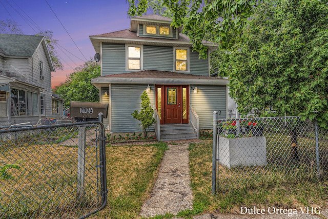 2025 Palace Ave SW, Grand Rapids, MI 49507 - american foursquare style home featuring a gate and roof with shingles