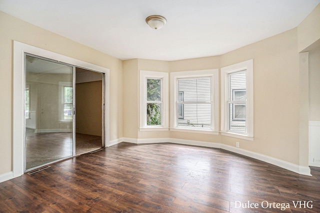 2025 Palace Ave SW, Grand Rapids, MI 49507 - unfurnished room featuring dark wood finished floors