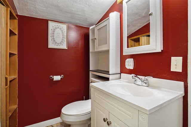 95 W N St, Ionia, MI 48846 - half bathroom featuring a textured ceiling, vanity, and vaulted ceiling