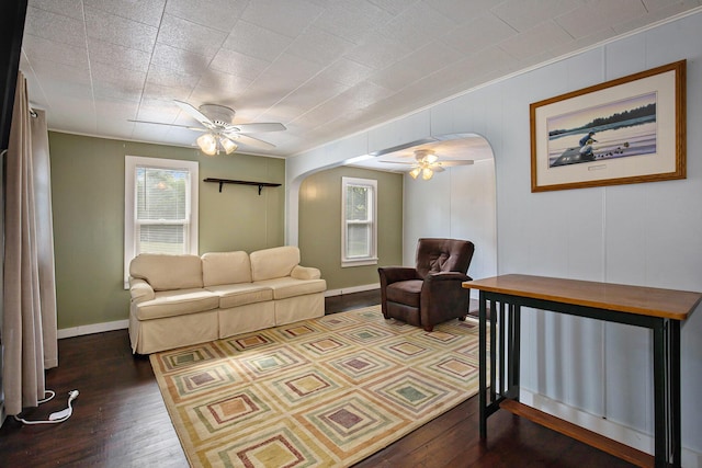 95 W N St, Ionia, MI 48846 - living room with arched walkways, ceiling fan, and hardwood / wood-style floors