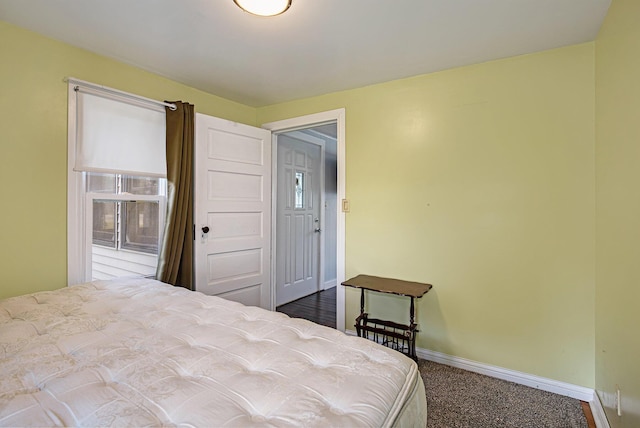 95 W N St, Ionia, MI 48846 - carpeted bedroom with baseboards