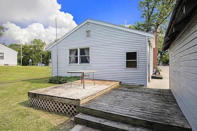 95 W N St, Ionia, MI 48846 - wooden deck featuring a yard