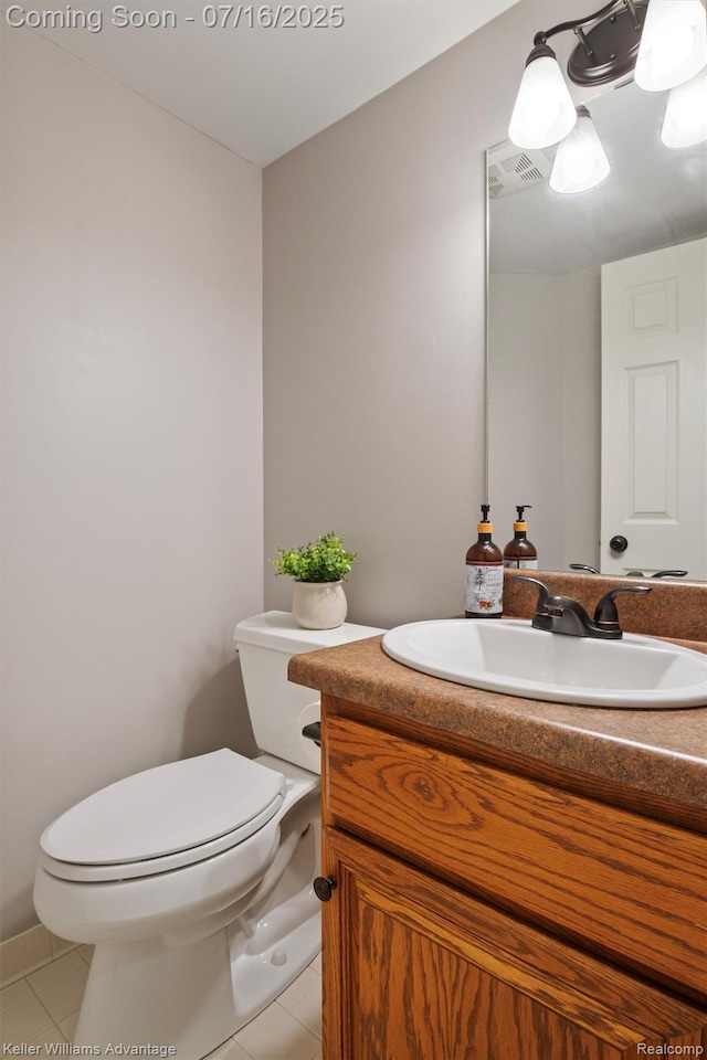 7741 Lake Ridge Dr, Commerce Twp, MI 48327 - bathroom with vanity and tile patterned floors