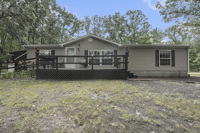 797 Beaver Rd, Bitely, MI 49309 - view of front of property featuring a deck