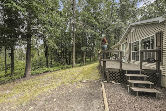 797 Beaver Rd, Bitely, MI 49309 - view of yard featuring a deck