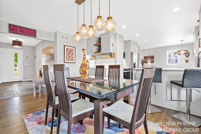 116 Loch Lomond Ave NE, Grand Rapids, MI 49546 - dining area with wood finished floors and recessed lighting