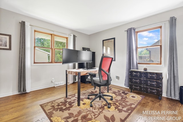 116 Loch Lomond Ave NE, Grand Rapids, MI 49546 - office area featuring wood finished floors and baseboards