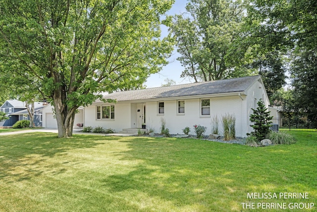 116 Loch Lomond Ave NE, Grand Rapids, MI 49546 - single story home featuring an attached garage, a front yard, and brick siding