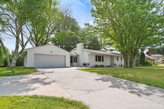 116 Loch Lomond Ave NE, Grand Rapids, MI 49546 - ranch-style home featuring an attached garage, driveway, a front yard, and a chimney