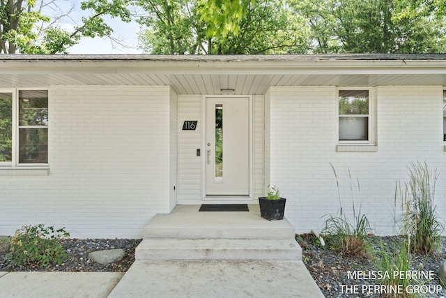 116 Loch Lomond Ave NE, Grand Rapids, MI 49546 - view of exterior entry featuring brick siding