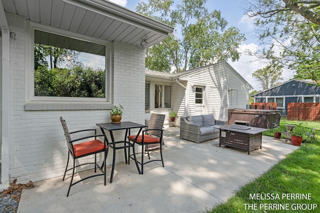 116 Loch Lomond Ave NE, Grand Rapids, MI 49546 - view of patio featuring a hot tub, outdoor dining area, and an outdoor living space