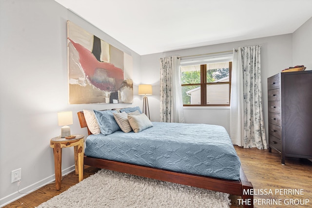116 Loch Lomond Ave NE, Grand Rapids, MI 49546 - bedroom featuring wood finished floors