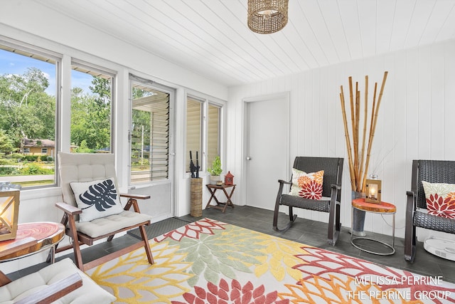 116 Loch Lomond Ave NE, Grand Rapids, MI 49546 - sitting room featuring plenty of natural light and wooden walls