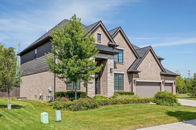 3909 Sandpiper Dr, Troy, MI 48083 - view of front of property with brick siding, a garage, a standing seam roof, and driveway