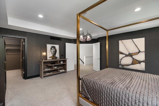 3909 Sandpiper Dr, Troy, MI 48083 - bedroom featuring light carpet, a spacious closet, and recessed lighting