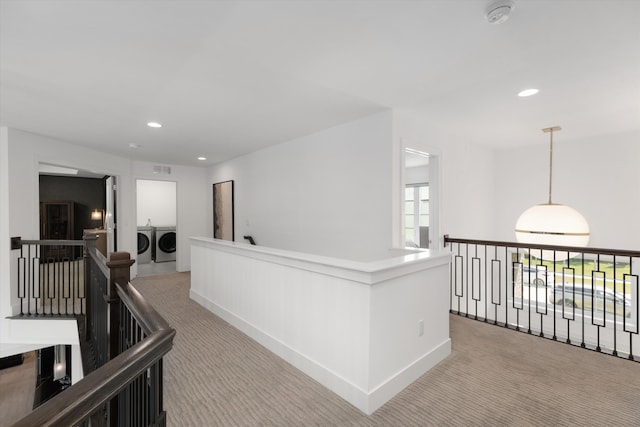 3909 Sandpiper Dr, Troy, MI 48083 - hallway featuring washer and dryer, an upstairs landing, carpet, and recessed lighting