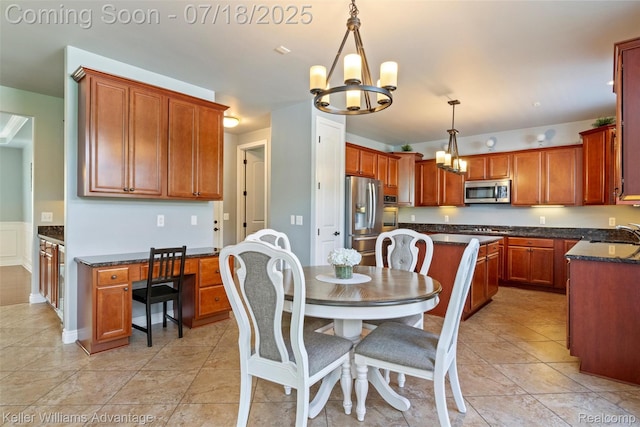 25506 Stanley Ln, South Lyon, MI 48178 - dining area featuring a chandelier and light tile patterned floors