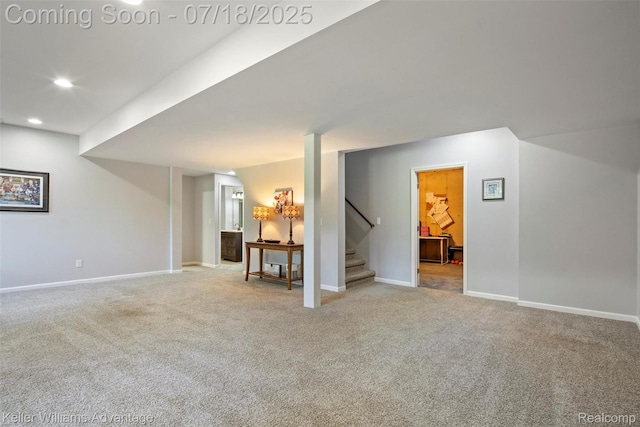 25506 Stanley Ln, South Lyon, MI 48178 - living area featuring carpet flooring, stairs, and recessed lighting