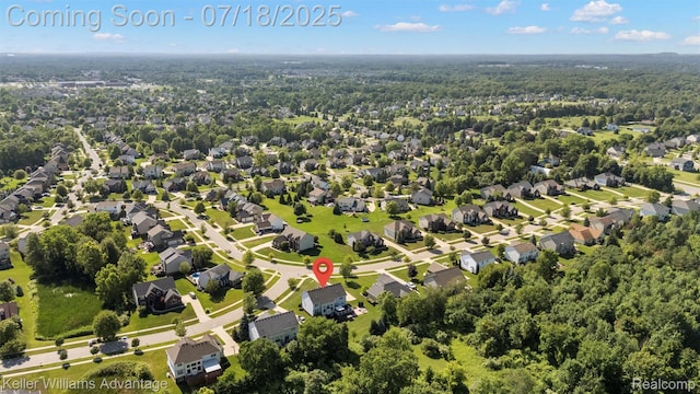 25506 Stanley Ln, South Lyon, MI 48178 - aerial view of property's location featuring a forest and nearby suburban area