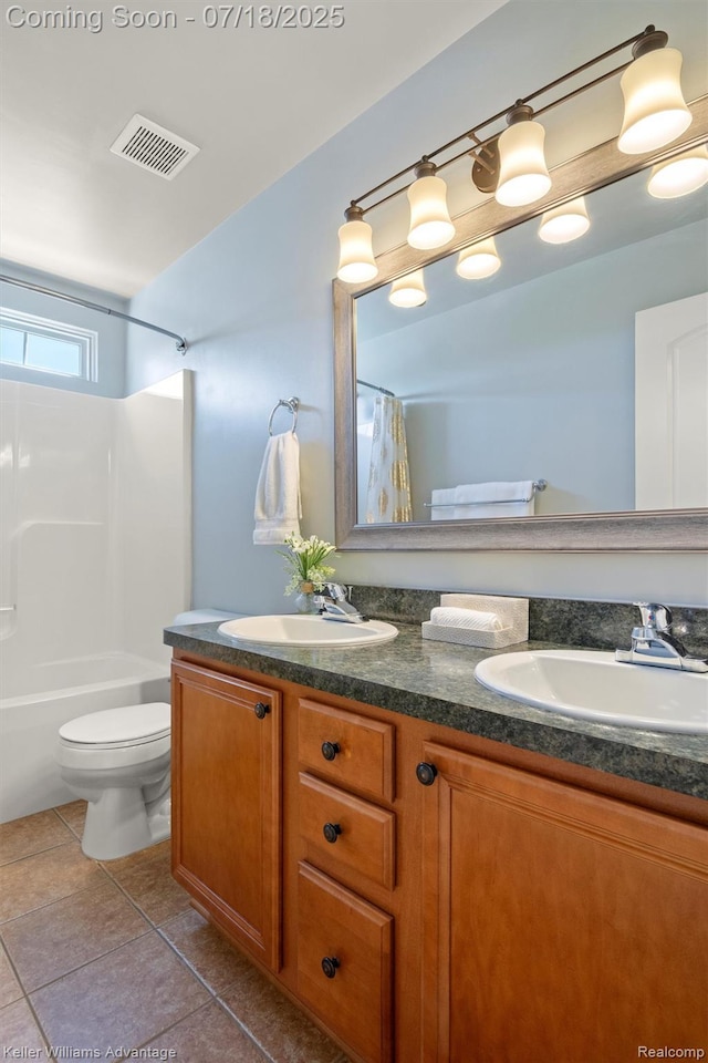 25506 Stanley Ln, South Lyon, MI 48178 - bathroom with double vanity, tile patterned floors, and shower / bath combination with curtain