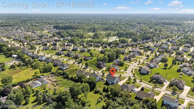 25506 Stanley Ln, South Lyon, MI 48178 - aerial perspective of suburban area featuring a forest