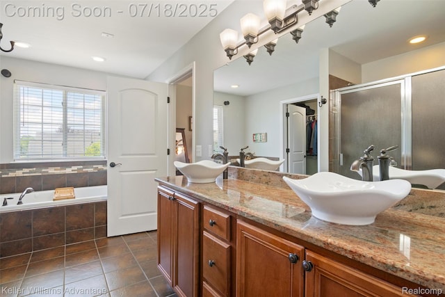 25506 Stanley Ln, South Lyon, MI 48178 - full bath with tile patterned flooring, double vanity, a stall shower, a bath, and a walk in closet