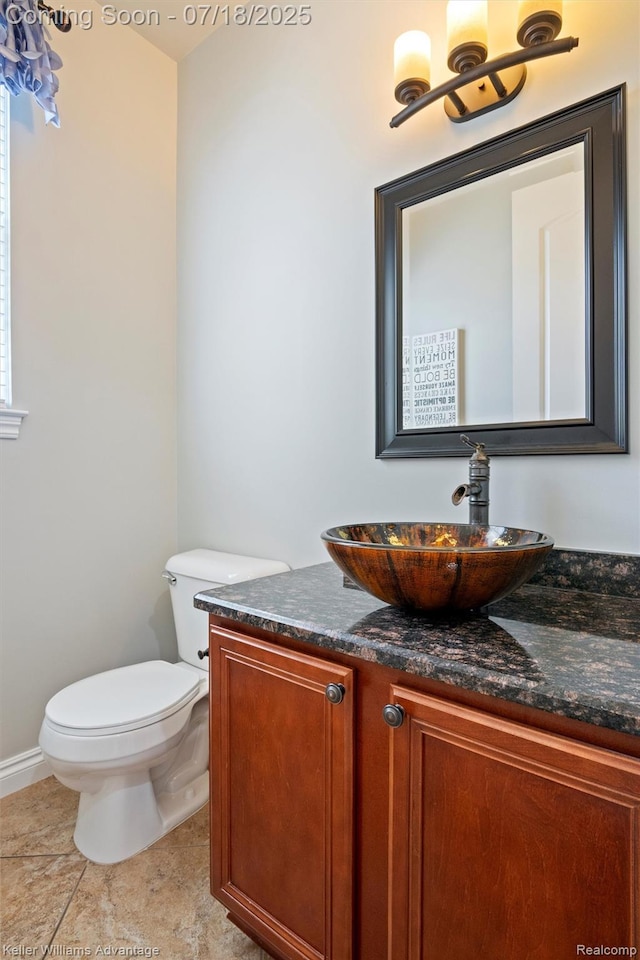 25506 Stanley Ln, South Lyon, MI 48178 - half bath featuring vanity and tile patterned floors