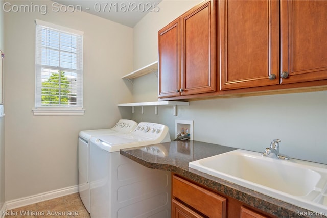 25506 Stanley Ln, South Lyon, MI 48178 - washroom with washing machine and dryer, cabinet space, and light tile patterned floors