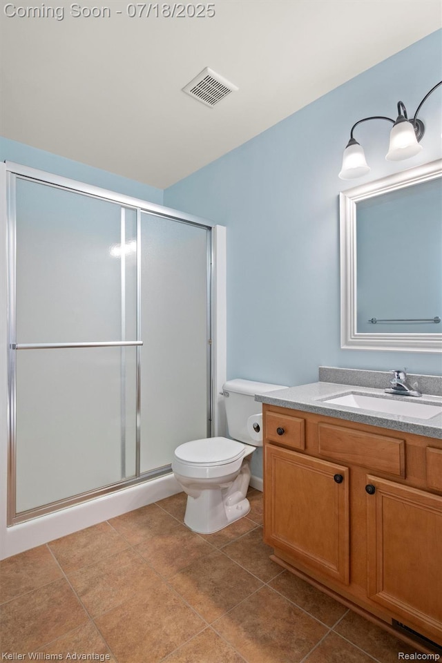 25506 Stanley Ln, South Lyon, MI 48178 - bathroom featuring vanity, a shower stall, and tile patterned floors