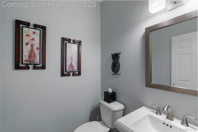 9589 Wellington Ct, Clarkston, MI 48348 - bathroom with toilet and a sink