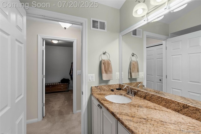 9589 Wellington Ct, Clarkston, MI 48348 - bathroom featuring vanity and baseboards
