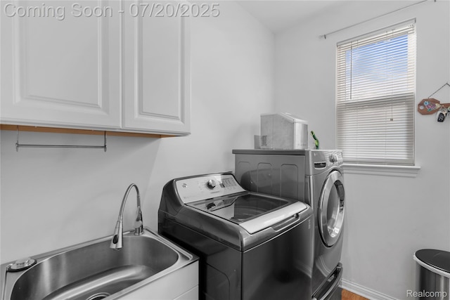 9589 Wellington Ct, Clarkston, MI 48348 - laundry room with cabinet space, separate washer and dryer, and wood finished floors