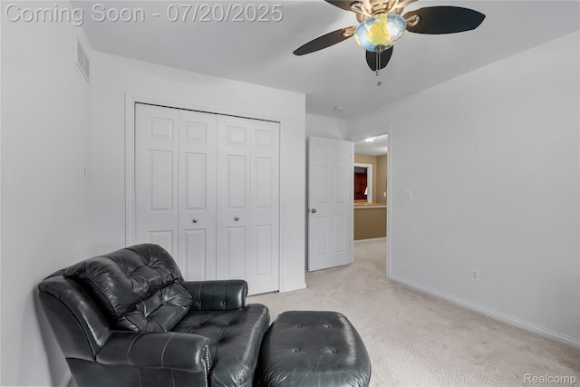 9589 Wellington Ct, Clarkston, MI 48348 - living area featuring light carpet and a ceiling fan
