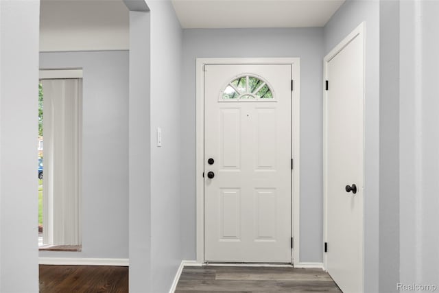 24270 Scotia Rd, Oak Park, MI 48237 - foyer entrance with dark wood-style flooring and baseboards