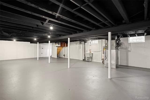24270 Scotia Rd, Oak Park, MI 48237 - basement with stairway and gas water heater