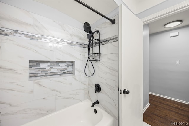 24270 Scotia Rd, Oak Park, MI 48237 - bathroom featuring tub / shower combination and wood finished floors