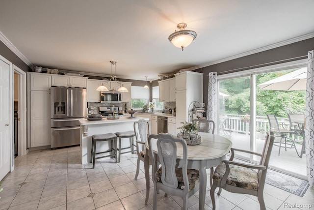 4500 Red Oak Blvd, Waterford, MI 48329 - dining room with ornamental molding and light tile patterned floors