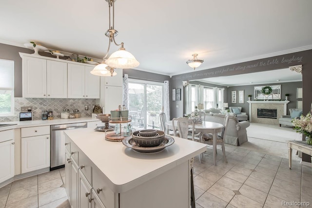 4500 Red Oak Blvd, Waterford, MI 48329 - kitchen with dishwasher, ornamental molding, a premium fireplace, light countertops, and plenty of natural light