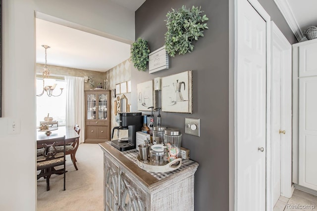 4500 Red Oak Blvd, Waterford, MI 48329 - hall with light carpet and a chandelier