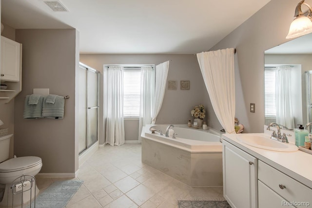4500 Red Oak Blvd, Waterford, MI 48329 - full bathroom featuring a garden tub, vanity, a stall shower, and tile patterned floors