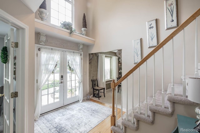 4500 Red Oak Blvd, Waterford, MI 48329 - entryway with french doors, stairway, plenty of natural light, and a high ceiling