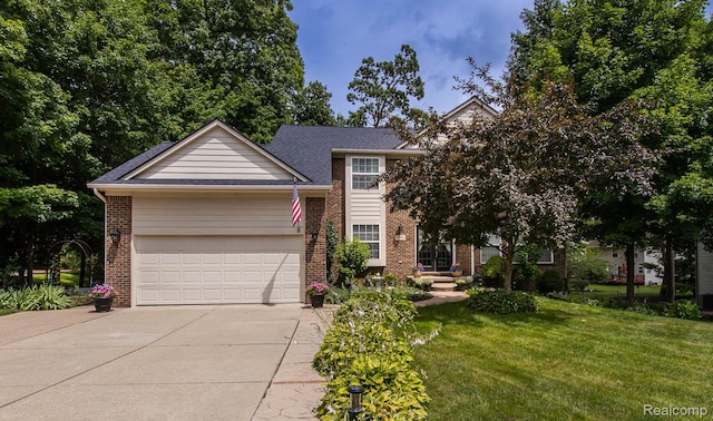 4500 Red Oak Blvd, Waterford, MI 48329 - view of front of property with concrete driveway, brick siding, a front lawn, an attached garage, and roof with shingles