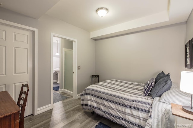 4500 Red Oak Blvd, Waterford, MI 48329 - bedroom featuring wood finished floors and ensuite bath