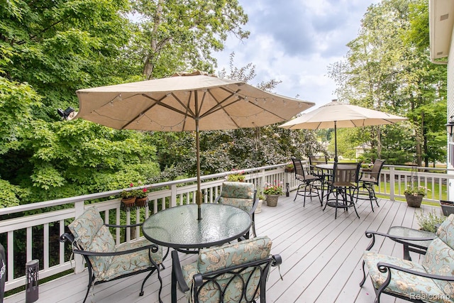 4500 Red Oak Blvd, Waterford, MI 48329 - wooden deck featuring outdoor dining area